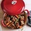Tramontina 5.5 Qt Enameled Cast-Iron Series 1000 Covered Round Dutch Oven - Gradated Red 2 Tramontina 5.5 Qt Enameled Cast-Iron Series 1000 Covered Round Dutch Oven - Gradated Red -Tramontina 80131047PRM001G