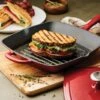 Tramontina 11 In Enameled Cast-Iron Series 1000 Grill Pan With Press - Gradated Red 2 Tramontina 11 In Enameled Cast-Iron Series 1000 Grill Pan With Press - Gradated Red -Tramontina 80131059PRM001G